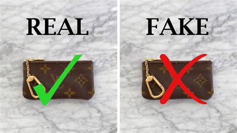 louis vuitton lock and key real vs fake|how to check if louis vuitton is real.